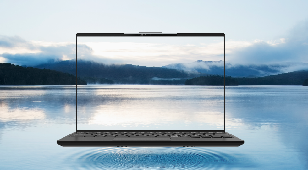 Fujitsu LIFEBOOK UH-X laptop, lid open, showing a 14-inch screen with a mountain-and-lake landscape wallpaper. Black chassis with thin bezels.